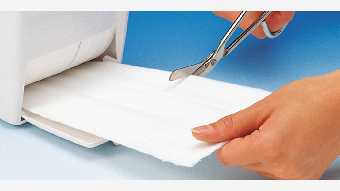 Fil-Zellin, the absorbent dressing pad on rolls, may be cut into any shape and is therefore particularly economical in use.