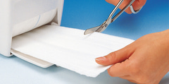 Fil-Zellin, the absorbent dressing pad on rolls, may be cut into any shape and is therefore particularly economical in use.