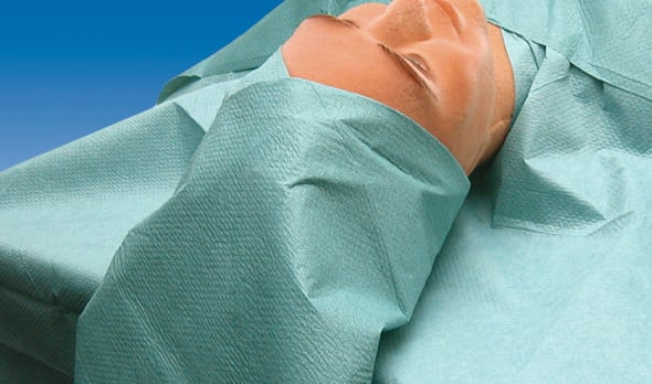 Both drapes are linked to each other so as to enable complete coverage of the head.