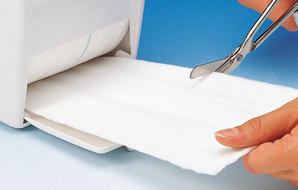 Fil-Zellin, the absorbent dressing pad on rolls, may be cut into any shape and is therefore particularly economical in use.